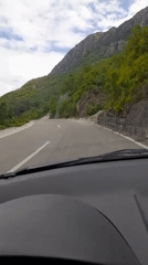 Driver navigates mountain road in Bukovik, Montenegro