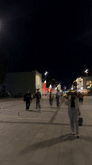 Nizhny Novgorod pedestrian street at night, mosaic dragon nearby