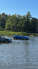 Summer afternoon leisure activities at Svetlogorsk lake with fountain