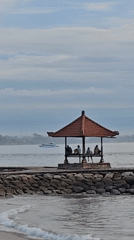 Beach life documented during golden hour in Denpasar