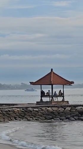 Beach life documented during golden hour in Denpasar