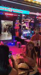 Bangkok nightlife district bustling with diners and entertainment seekers