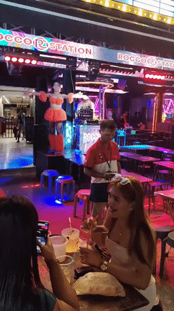 Bangkok nightlife district bustling with diners and entertainment seekers