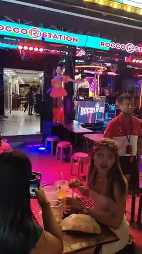 Bangkok nightlife district bustling with diners and entertainment seekers