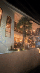 Nighttime dining and decorative lanterns observed in Denpasar