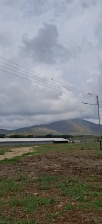 Overcast skies blanket rural Vallecito, Venezuela Sunday evening