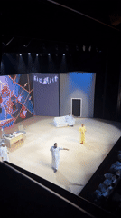 Theater performance features actors in traditional Saudi Arabian attire