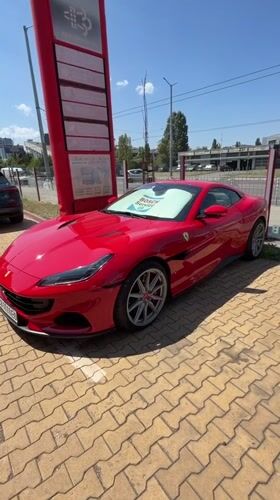 Red Ferrari Portofino parked at Bosch Service, Sofia