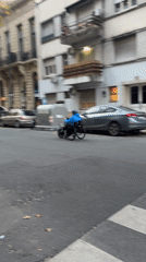 Routine street activity captured in Buenos Aires evening
