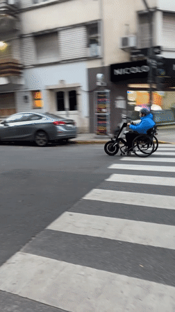 Routine street activity captured in Buenos Aires evening