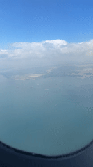 Passenger documents Turkish Airlines flight over coastal city