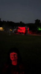 Inside a red-lit venue during a live event in Georgia