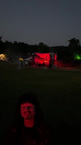 Inside a red-lit venue during a live event in Georgia