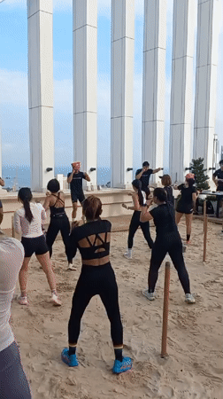 Boxing exercise class held on Pattaya rooftop with ocean views