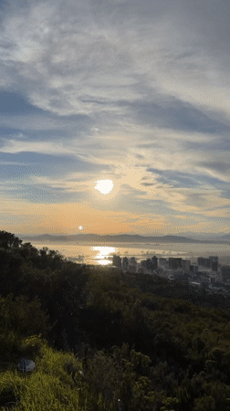 Cape Town at sunrise, seen from above the mountain range