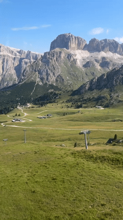 Summer morning hiking and chilling in the Canazei Dolomites
