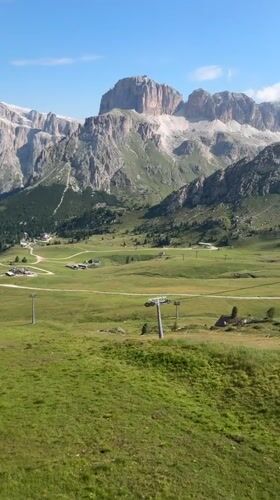 Summer morning hiking and chilling in the Canazei Dolomites