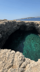 Aerial footage captures sea grotto in Malta's rocky cliffs