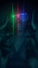 Person spotted wearing LED laser glasses in Nigeria nighttime gathering
