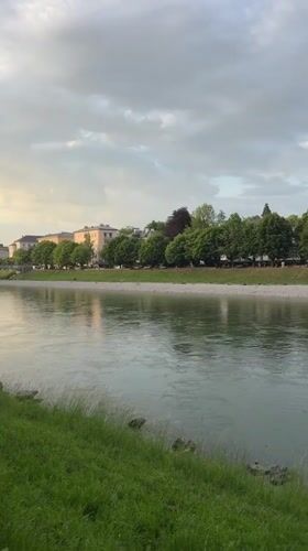 River scene with church spire filmed in Salzburg