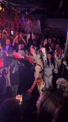 Female DJ draws crowds at Berlin nightclub performance