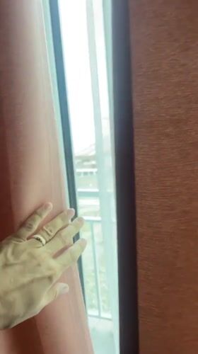 Woman enjoys quiet morning moments at Abkhazia oceanfront residence