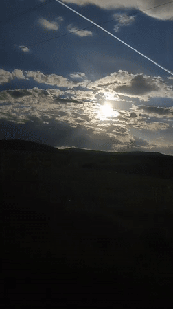 Contrails and dog captured in Bankya countryside scenes
