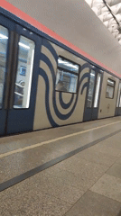 Moscow Metro train arrives at Kuznetsky Most station