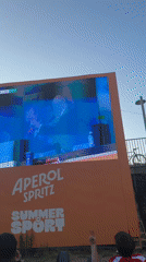 Outdoor crowd watches Spain vs. Argentina at Aperol-sponsored screening