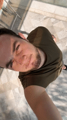 Young man documents afternoon with selfies, dog in Mexico