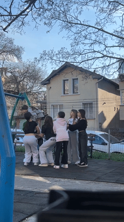 Teenagers gather for playground activities in Ruse, Bulgaria
