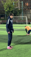 Soccer practice captured on artificial turf field in Tbilisi