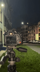 Camera setup records apartment buildings at night in Perm