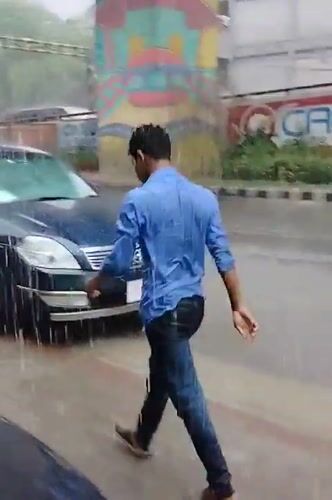 Rainy morning street life documented across Dhaka, Bangladesh