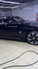 Black Rolls-Royce in a Moscow detailing shop
