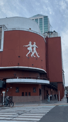 Street scenes captured in Buenos Aires showing sculpture, crane
