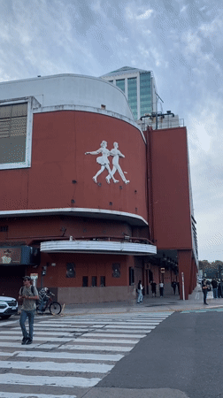 Street scenes captured in Buenos Aires showing sculpture, crane