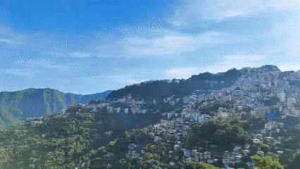 Aizawl from above and up close, hills, flowers, and city views