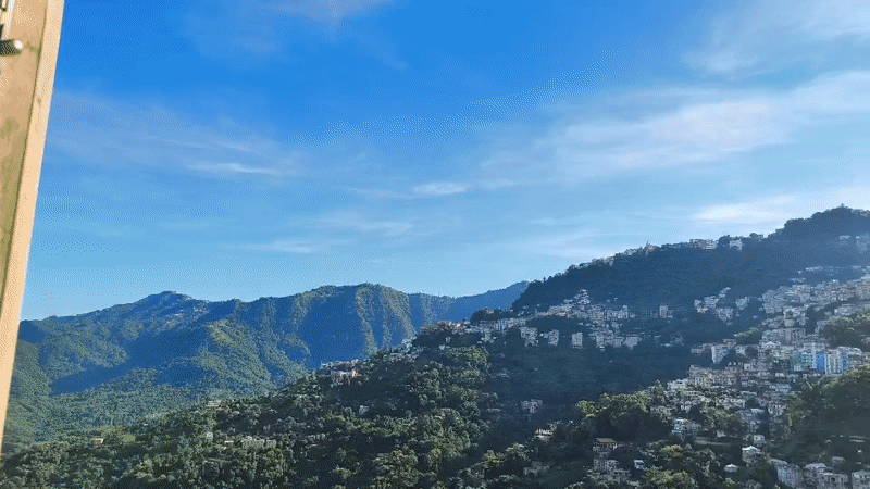 Aizawl from above and up close, hills, flowers, and city views