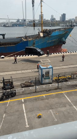 Routine port operations and tourism activity observed in Vladivostok