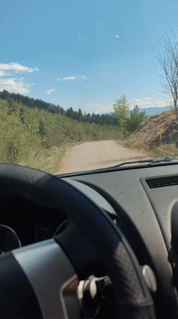 Motorist documents scenic drive through rural Lokorsko, Bulgaria countryside