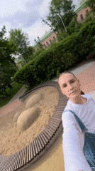 Woman films herself at Moscow playground with toddler present