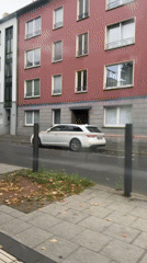 Moving through rainy Krefeld streets on a grey afternoon