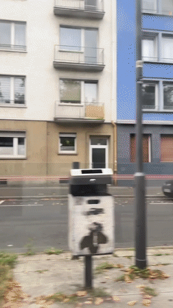 Moving through rainy Krefeld streets on a grey afternoon