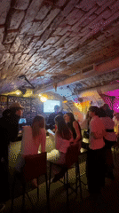 Nightlife venue captured in Krasnoyarsk bar with brick interior