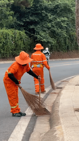 Morning street cleaning captured in Da Lat, Vietnam