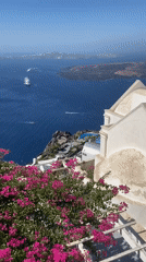 Morning views along Santorini's white-and-blue caldera edge