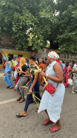 Palm Sunday procession with cross-shaped fronds held in Lagos