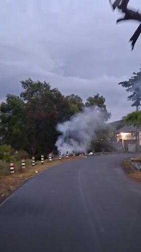 Overcast evening scenes documented across Lhokseumawe waterways and roads