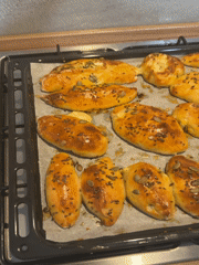 Seeded bread rolls baked in Catania kitchen oven